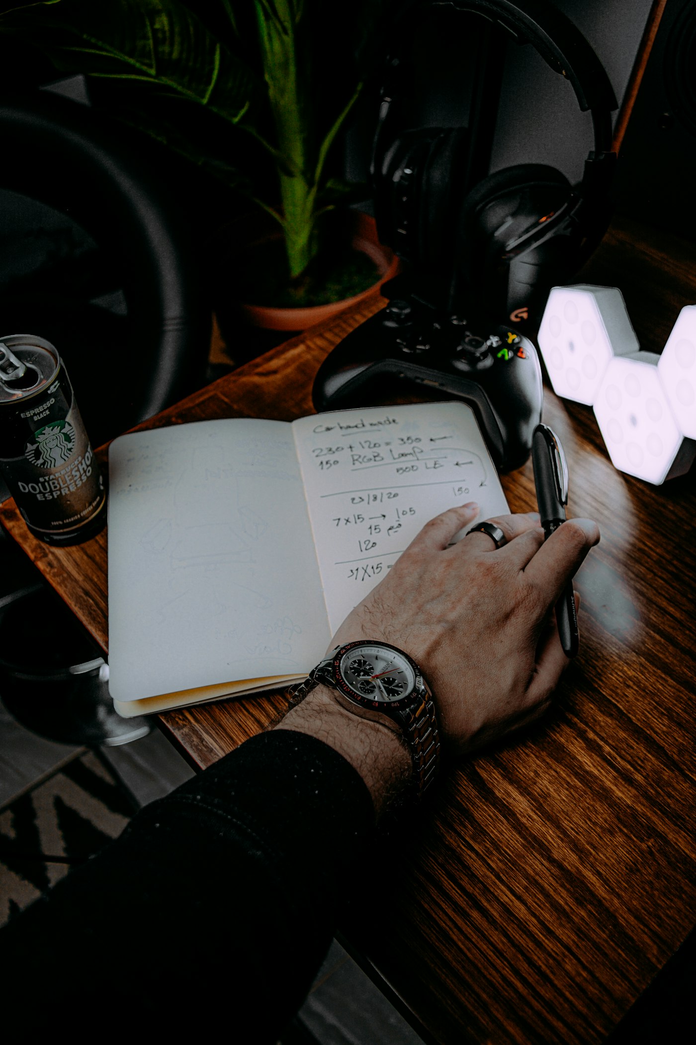 Loop Watch on a wrist at the studio desk