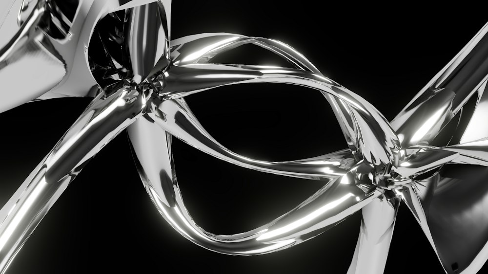 Machined metal object on a black surface